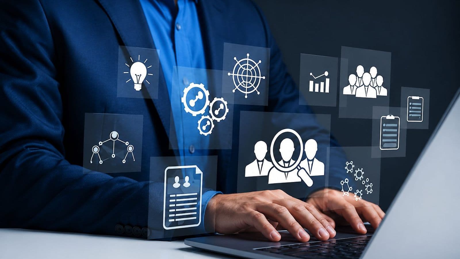 IT professional at a laptop with service management icons